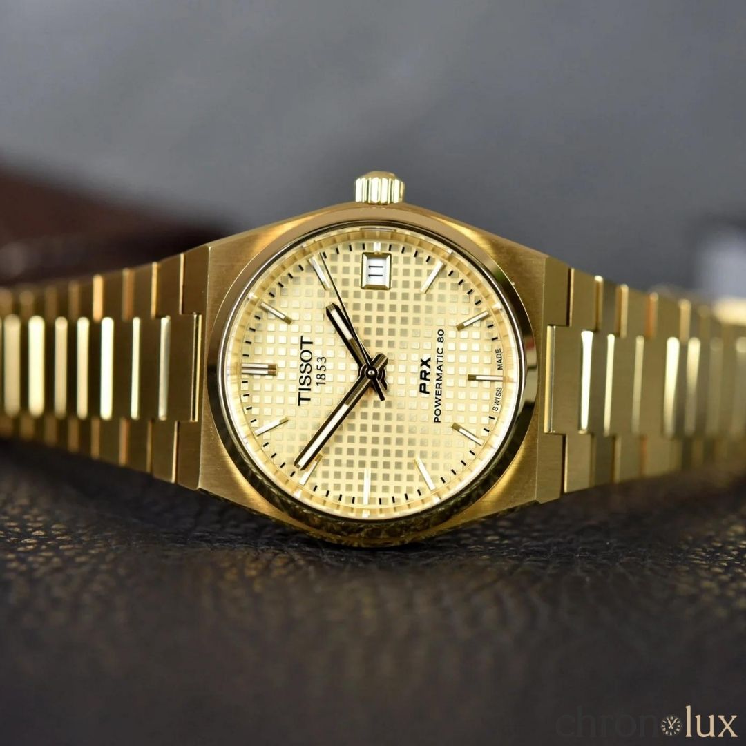 TISSOT PRX POWERMATIC 40MM - GOLD